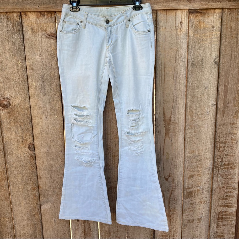 Carmar Distressed Low Rise Flare Jean Size 24